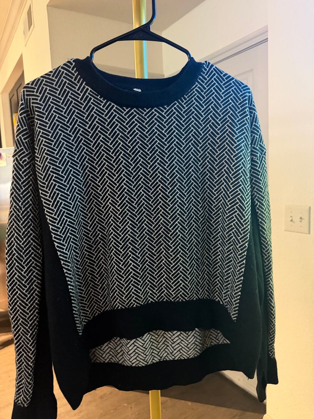 Lululemon Yogi crew sweater is made from black and white Merino wool